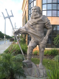 "Reveal", a sculpture of a man holding a trident