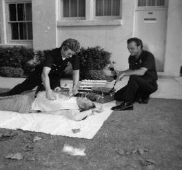 Black and white photo of emergency medical personnel