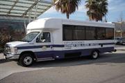 View of Dail-A-Ride vehicle in front of Downey Depot