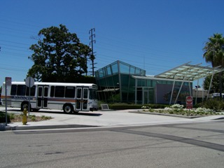 Front View of Downey Depot and DowneyLINK Bus leaving the depot